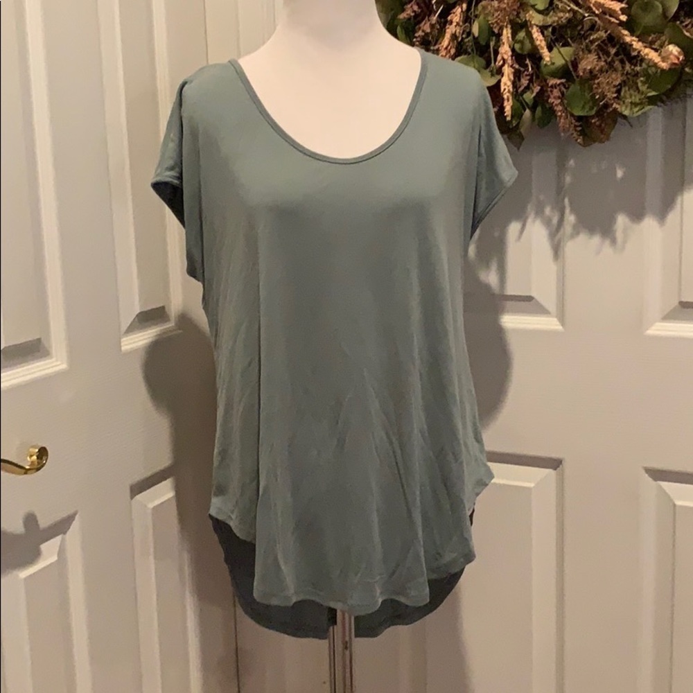 Grayish green tunic, scoop neck, longer in back